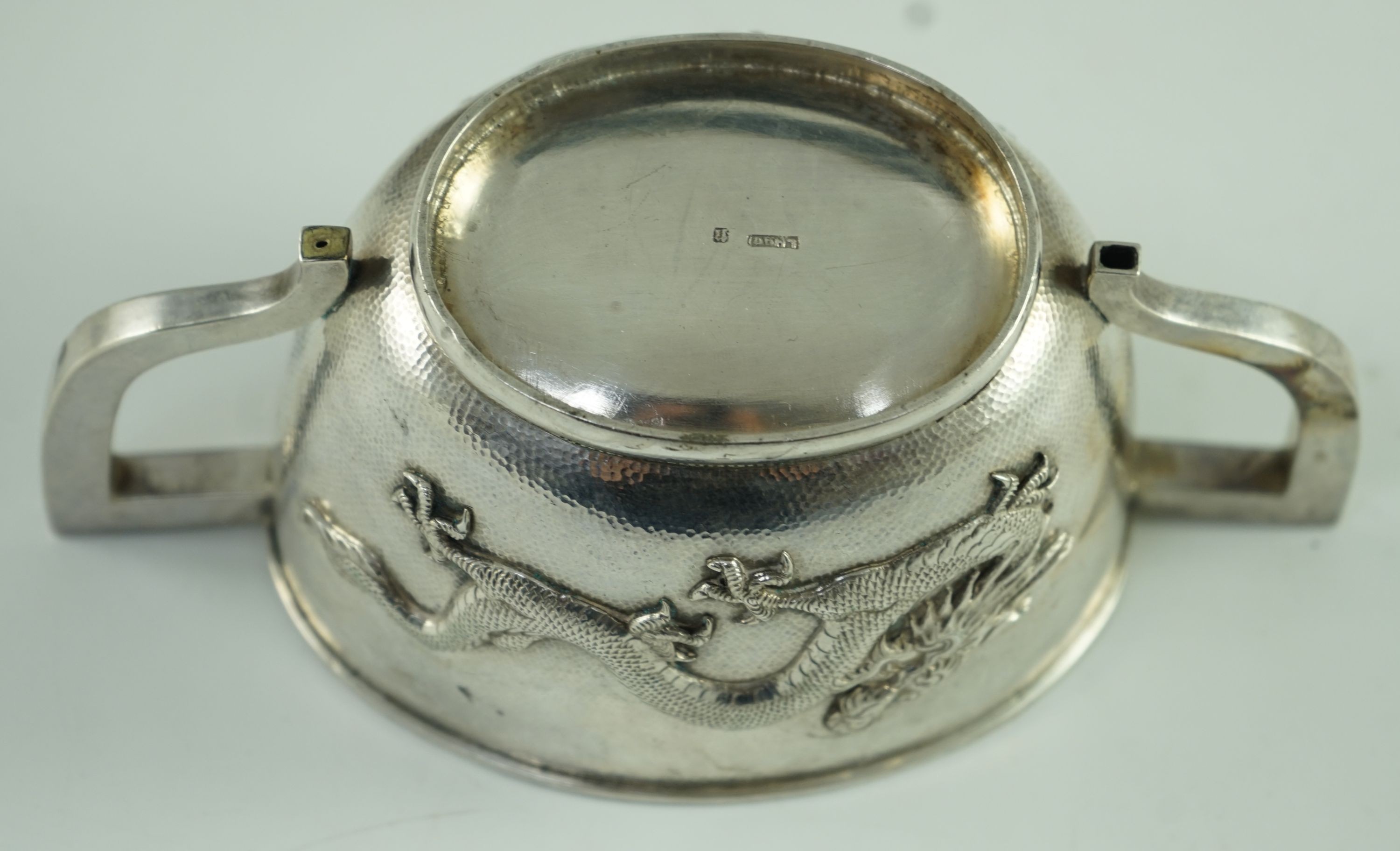 An early 20th century Chinese Export three piece silver tea set and matching silver inlaid hardwood two handled tea tray, by Luen Hing?